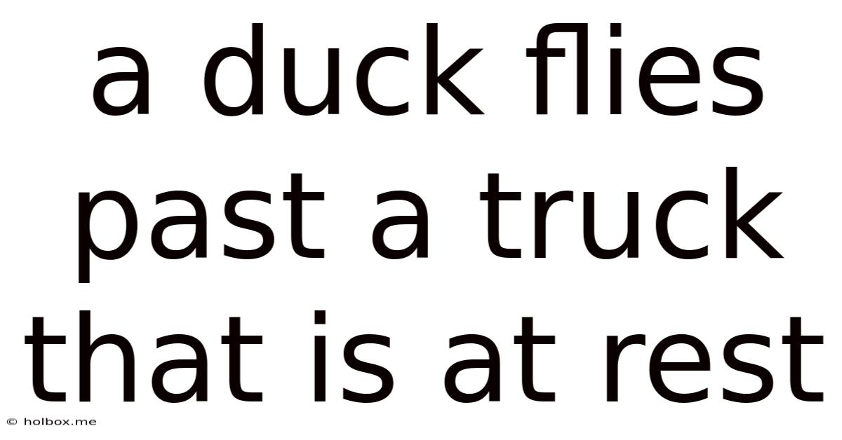 A Duck Flies Past A Truck That Is At Rest